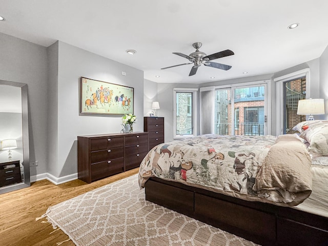 2736 N Hampden Ct Unit 105, Chicago, IL 60614 - bedroom with baseboards, wood finished floors, access to outside, recessed lighting, and a ceiling fan