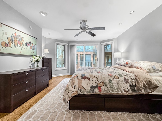 2736 N Hampden Ct Unit 105, Chicago, IL 60614 - bedroom with light wood-type flooring, access to exterior, recessed lighting, and a ceiling fan