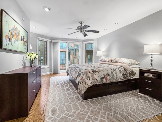 2736 N Hampden Ct Unit 105, Chicago, IL 60614 - bedroom with access to exterior, light wood-type flooring, a ceiling fan, recessed lighting, and baseboards