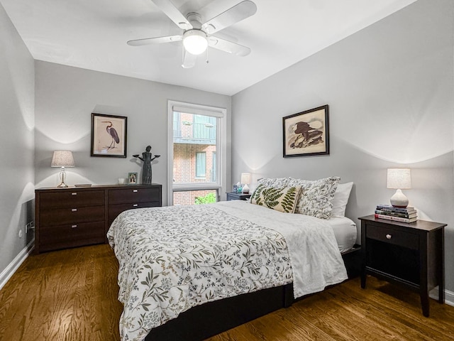 2736 N Hampden Ct Unit 105, Chicago, IL 60614 - bedroom with dark wood finished floors, baseboards, and ceiling fan