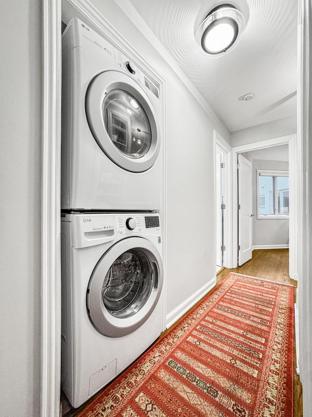 2736 N Hampden Ct Unit 105, Chicago, IL 60614 - washroom with stacked washer / drying machine and baseboards