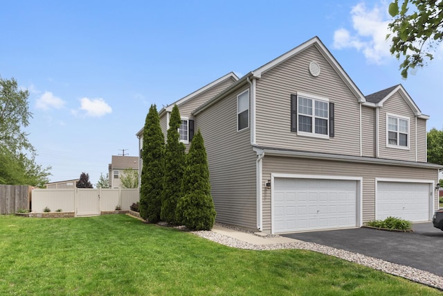 2911 Boone Ct, Joliet, IL 60435 - view of property exterior with asphalt driveway and a garage