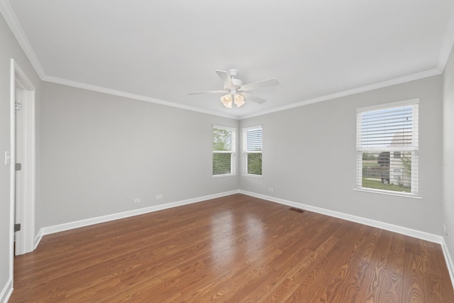 2911 Boone Ct, Joliet, IL 60435 - empty room with baseboards, a ceiling fan, ornamental molding, and dark wood-type flooring