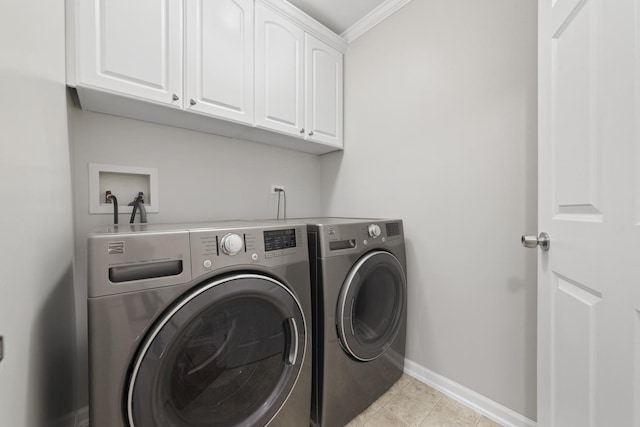 2911 Boone Ct, Joliet, IL 60435 - laundry room with cabinet space, washing machine and clothes dryer, ornamental molding, baseboards, and light tile patterned floors
