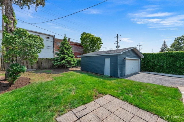 111 W N St, Plano, IL 60545 - view of yard featuring a garage and an outdoor structure