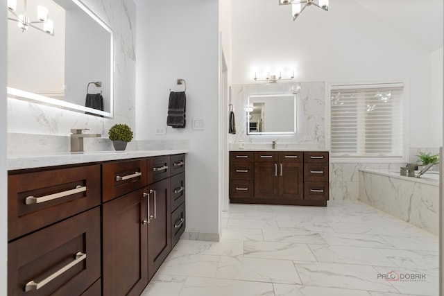 5272 Pineham Ct, Long Grove, IL 60047 - bathroom featuring two vanities, marble look tiles, and a bath