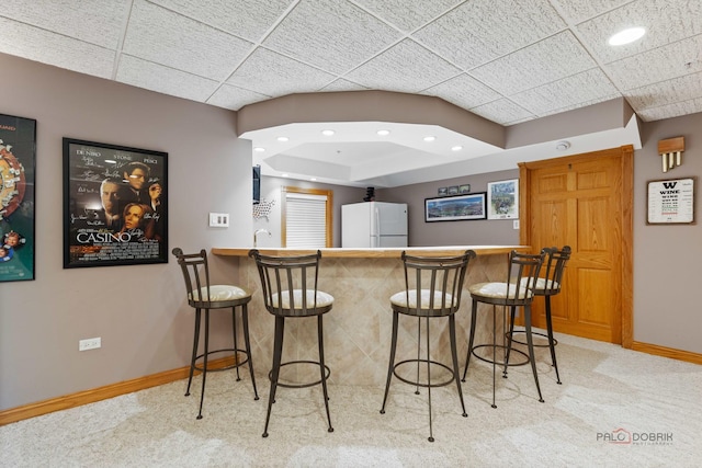 5272 Pineham Ct, Long Grove, IL 60047 - kitchen featuring freestanding refrigerator, baseboards, carpet flooring, a breakfast bar, and recessed lighting
