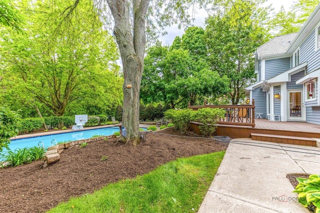 5272 Pineham Ct, Long Grove, IL 60047 - view of yard with a wooden deck and an outdoor pool