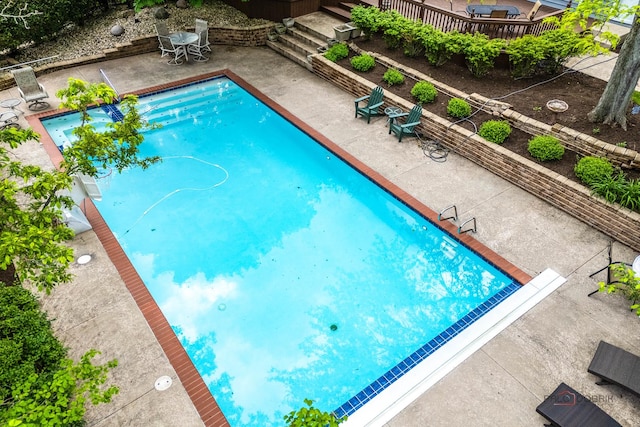 5272 Pineham Ct, Long Grove, IL 60047 - view of swimming pool featuring a patio and a wooden deck