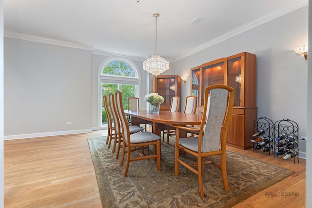 5272 Pineham Ct, Long Grove, IL 60047 - dining space featuring a chandelier, light wood-type flooring, ornamental molding, and baseboards