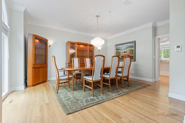 5272 Pineham Ct, Long Grove, IL 60047 - dining area featuring wood finished floors, a chandelier, baseboards, and crown molding