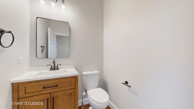 554 E Jackson St, Joliet, IL 60432 - half bath with toilet, vanity, and baseboards