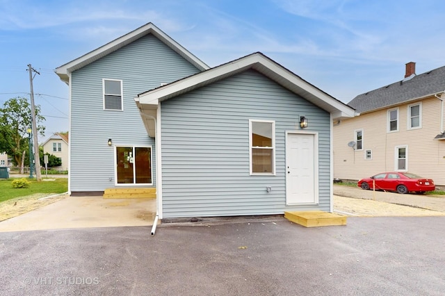 554 E Jackson St, Joliet, IL 60432 - rear view of house featuring a patio area