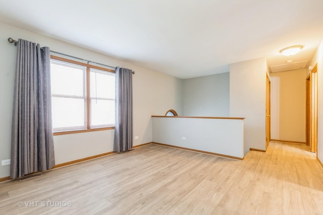 419 N Cresthill Ave, Mchenry, IL 60050 - empty room featuring light wood-style flooring, baseboards, and attic access