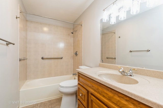 419 N Cresthill Ave, Mchenry, IL 60050 - full bath with vanity,  shower combination, toilet, and tile patterned flooring