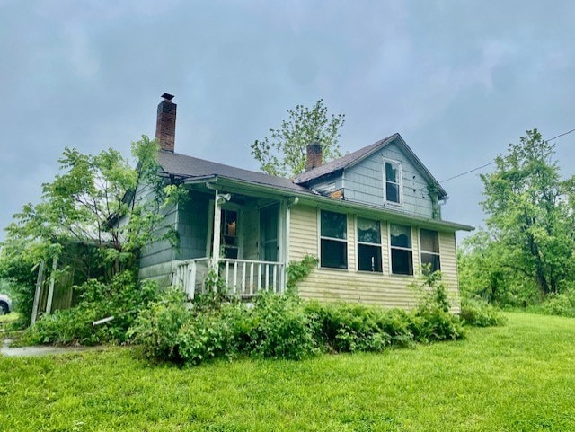 27844 1260 N Ave, Princeton, IL 61356 - view of home's exterior with a yard and a chimney