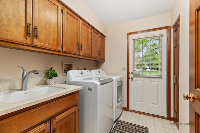 2872 Whispering Oaks Ct, Buffalo Grove, IL 60089 - washroom with independent washer and dryer, cabinet space, light flooring, and baseboards
