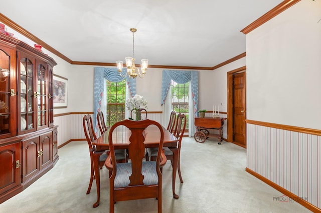 2872 Whispering Oaks Ct, Buffalo Grove, IL 60089 - dining space with a chandelier, light carpet, crown molding, and a wainscoted wall