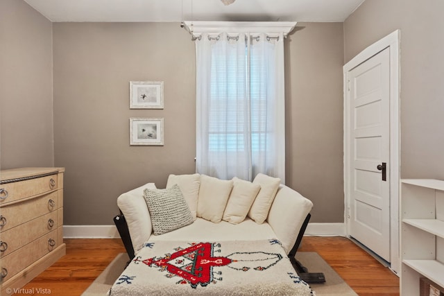 217 Circle Ave, Forest Park, IL 60130 - bedroom featuring multiple windows, wood finished floors, and baseboards