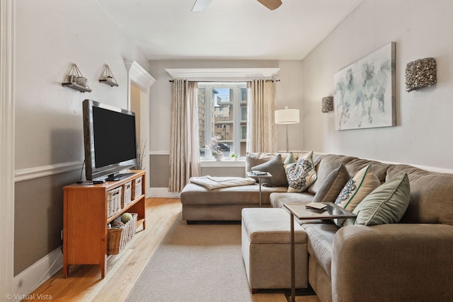 217 Circle Ave, Forest Park, IL 60130 - living area with wood finished floors, a ceiling fan, and baseboards