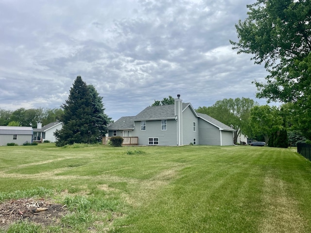 6760 N Summit Dr, Byron, IL 61010 - view of green lawn with a wooden deck