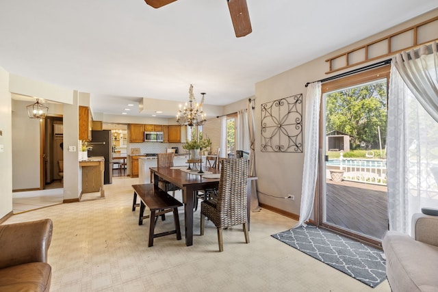 8340 W Monee Manhattan Rd, Monee, IL 60449 - dining room featuring a chandelier and a ceiling fan