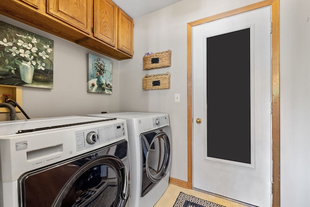 8340 W Monee Manhattan Rd, Monee, IL 60449 - laundry room featuring washer and dryer, cabinet space, and light tile patterned flooring
