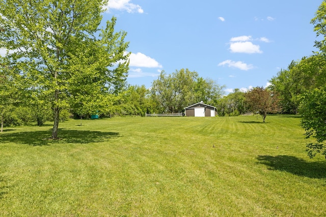 8340 W Monee Manhattan Rd, Monee, IL 60449 - view of green lawn with an outdoor structure and a detached garage