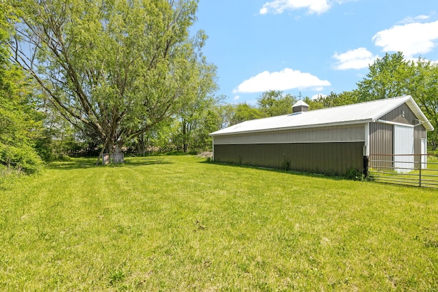 8340 W Monee Manhattan Rd, Monee, IL 60449 - view of green lawn featuring an outbuilding, an outdoor structure, and a detached garage