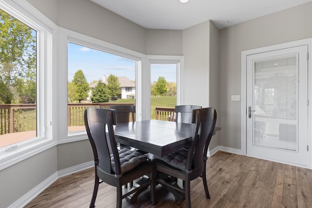 13084 Deer Xing, Roscoe, IL 61073 - dining space featuring wood finished floors and baseboards