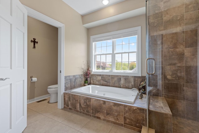 13084 Deer Xing, Roscoe, IL 61073 - full bath featuring toilet, a garden tub, tile patterned flooring, and tiled shower