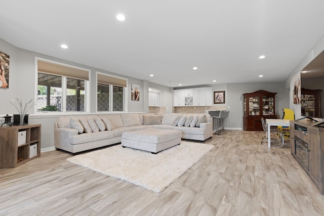 13084 Deer Xing, Roscoe, IL 61073 - living room with recessed lighting, baseboards, and light wood-style floors