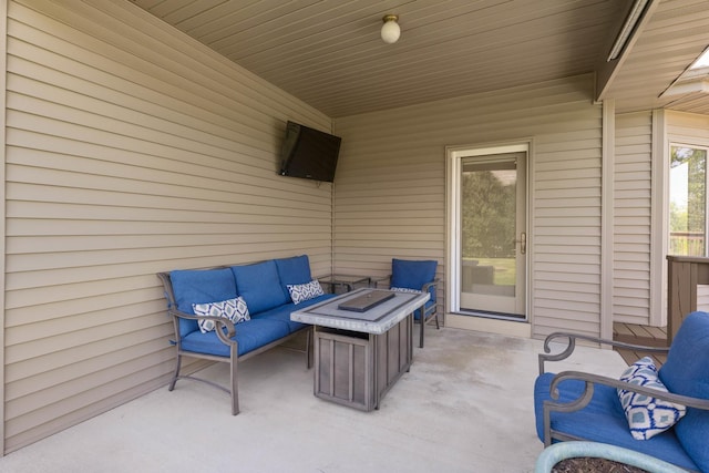 13084 Deer Xing, Roscoe, IL 61073 - view of patio featuring an outdoor living space with a fire pit