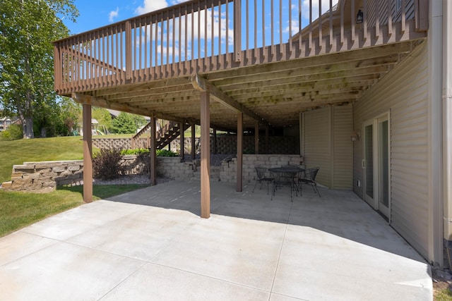 13084 Deer Xing, Roscoe, IL 61073 - view of patio with stairs, outdoor dining area, and a deck