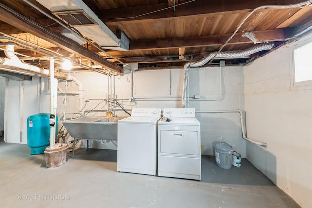 37756 N Cedar Lake Rd, Lake Villa, IL 60046 - basement featuring a water pressure tank and separate washer and dryer