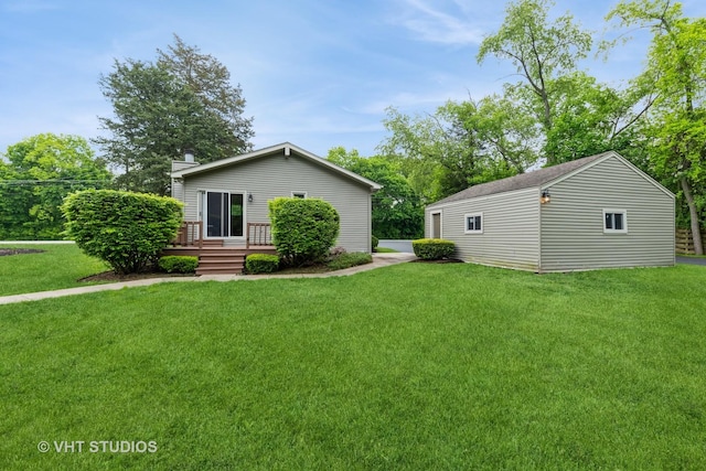 37756 N Cedar Lake Rd, Lake Villa, IL 60046 - view of grassy yard with a deck and an outbuilding