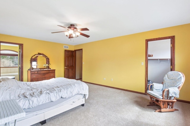 679 Gibbons Dr, New Lenox, IL 60451 - bedroom with light colored carpet, baseboards, a spacious closet, and ceiling fan