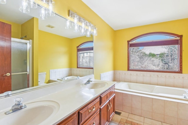 679 Gibbons Dr, New Lenox, IL 60451 - bathroom with a garden tub, a stall shower, tile patterned floors, toilet, and double vanity