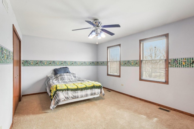 679 Gibbons Dr, New Lenox, IL 60451 - carpeted bedroom with baseboards and ceiling fan