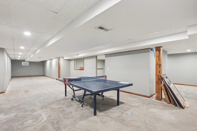 679 Gibbons Dr, New Lenox, IL 60451 - recreation room featuring baseboards, unfinished concrete flooring, a paneled ceiling, and recessed lighting