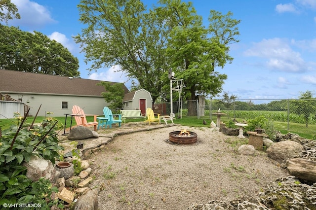 5207 Barnard Mill Rd, Ringwood, IL 60072 - view of yard with a fire pit and a storage shed