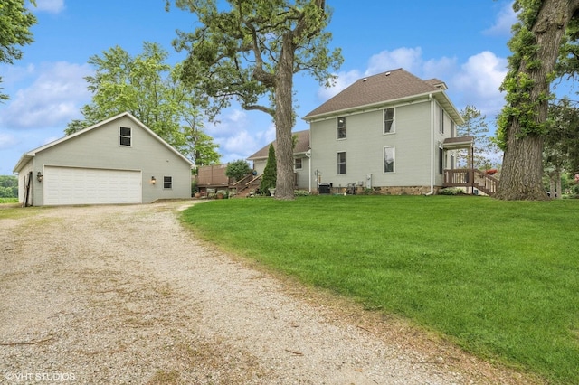 5207 Barnard Mill Rd, Ringwood, IL 60072 - view of side of property with a garage, a yard, and an outbuilding