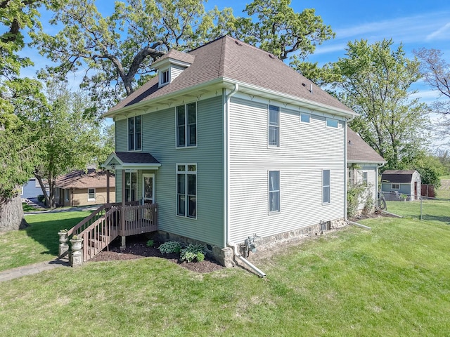 5207 Barnard Mill Rd, Ringwood, IL 60072 - back of property with a shingled roof