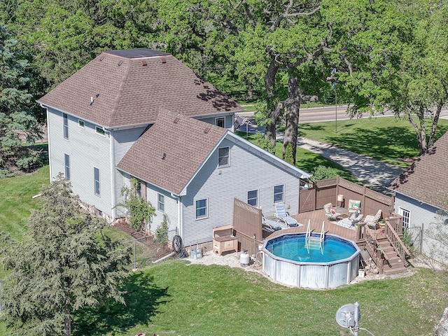 5207 Barnard Mill Rd, Ringwood, IL 60072 - rear view of house featuring roof with shingles, a fenced backyard, and a deck