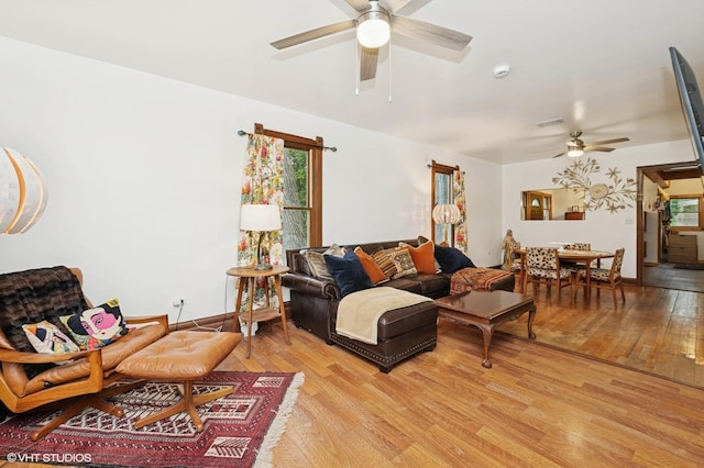 5207 Barnard Mill Rd, Ringwood, IL 60072 - living area featuring a ceiling fan and light wood-type flooring