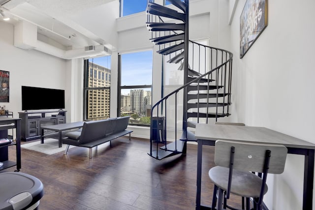 633 S Plymouth Ct Unit 701, Chicago, IL 60605 - living area featuring wood finished floors, stairway, and a high ceiling