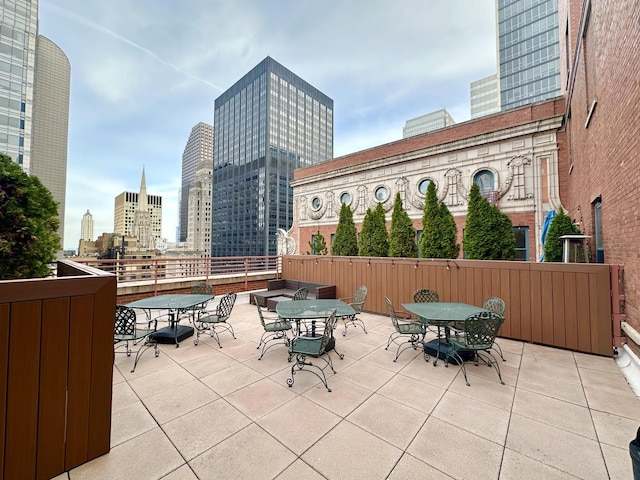 208 W Washington St Unit 1711, Chicago, IL 60606 - view of patio / terrace featuring outdoor dining space and a skyline view