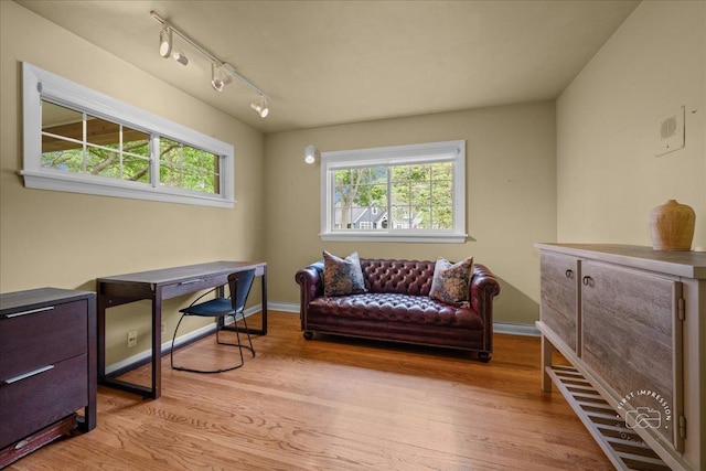 705 Meadows Rd, Geneva, IL 60134 - office space featuring wood finished floors, baseboards, and track lighting