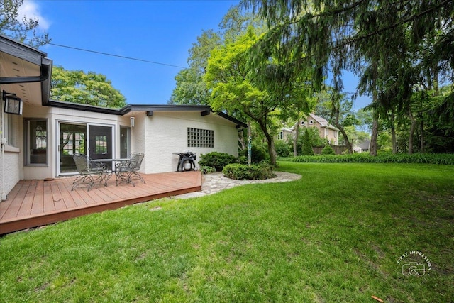 705 Meadows Rd, Geneva, IL 60134 - view of green lawn with a deck