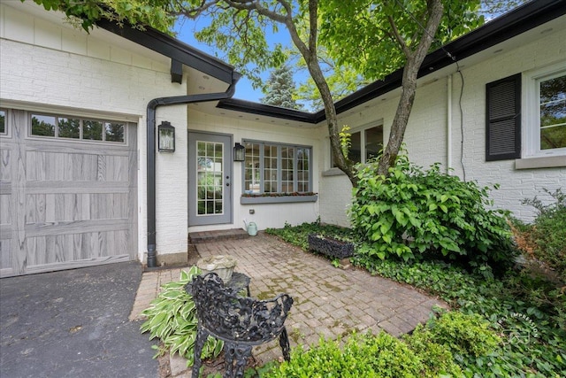 705 Meadows Rd, Geneva, IL 60134 - property entrance featuring a garage